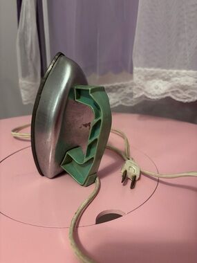 Vintage Small child’s Handheld Iron in Mint Green